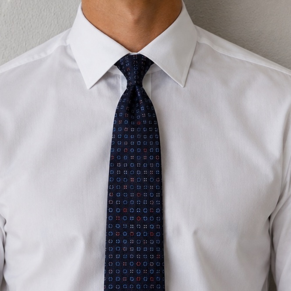 Salvatore Ferragamo Silk Navy Tie with Red and Blue Repeating Pattern